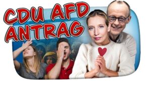 Thumbnail des Videos "GRR die CDU und AFD sind BÖSE GRR - Kuchen Talks #1052" vom Kanal KuchenTV: KuchenTV sitzt vor einem Mikrofon und schaut ernst in die Kamera, im Hintergrund sind politische Symbole und Logos der CDU und AFD zu sehen.